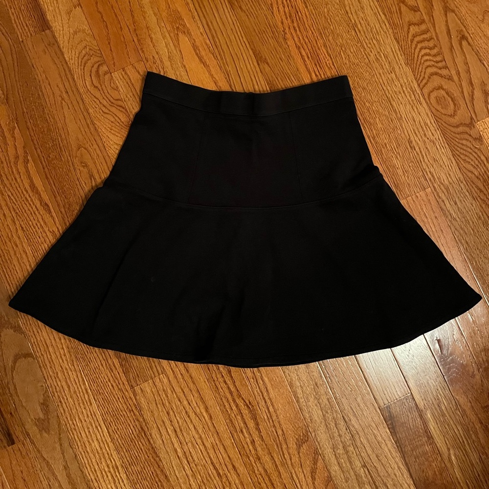 Cute black skirt for work or casual!  Sean detail as shown.